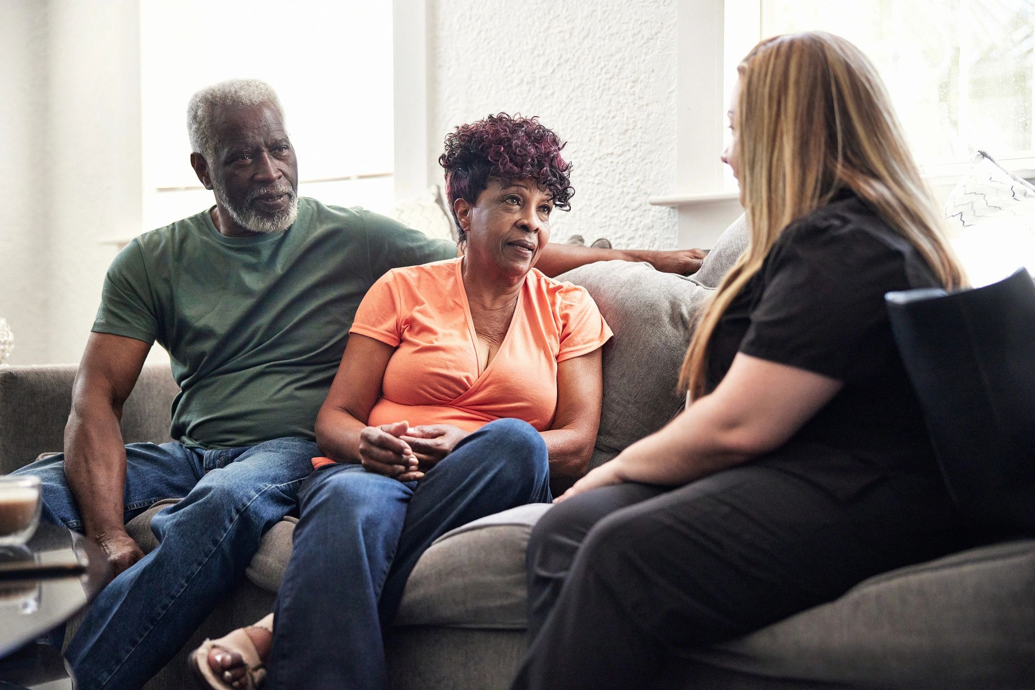Caregiver discussing senior living options with family
