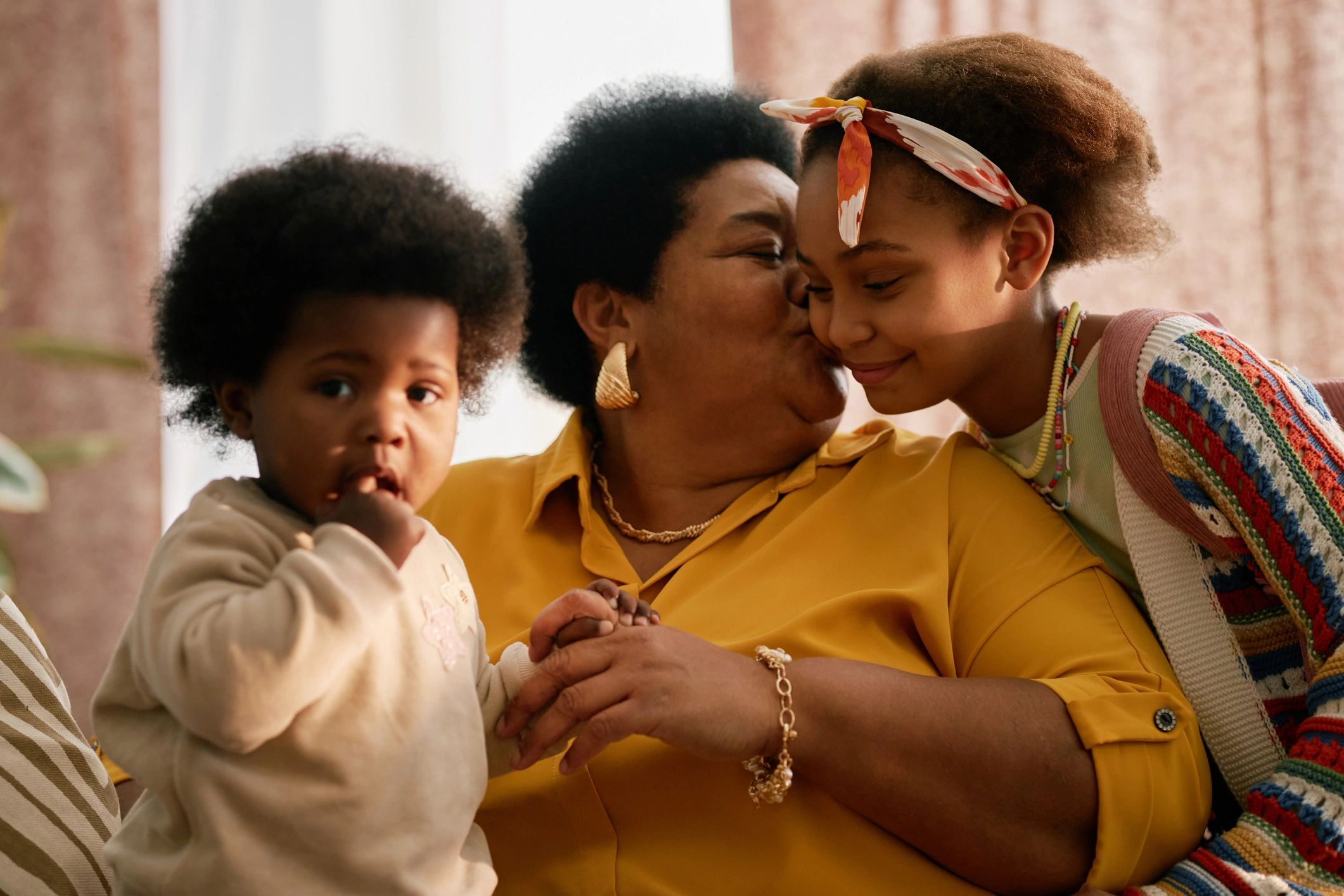 Family sharing a caring moment at home