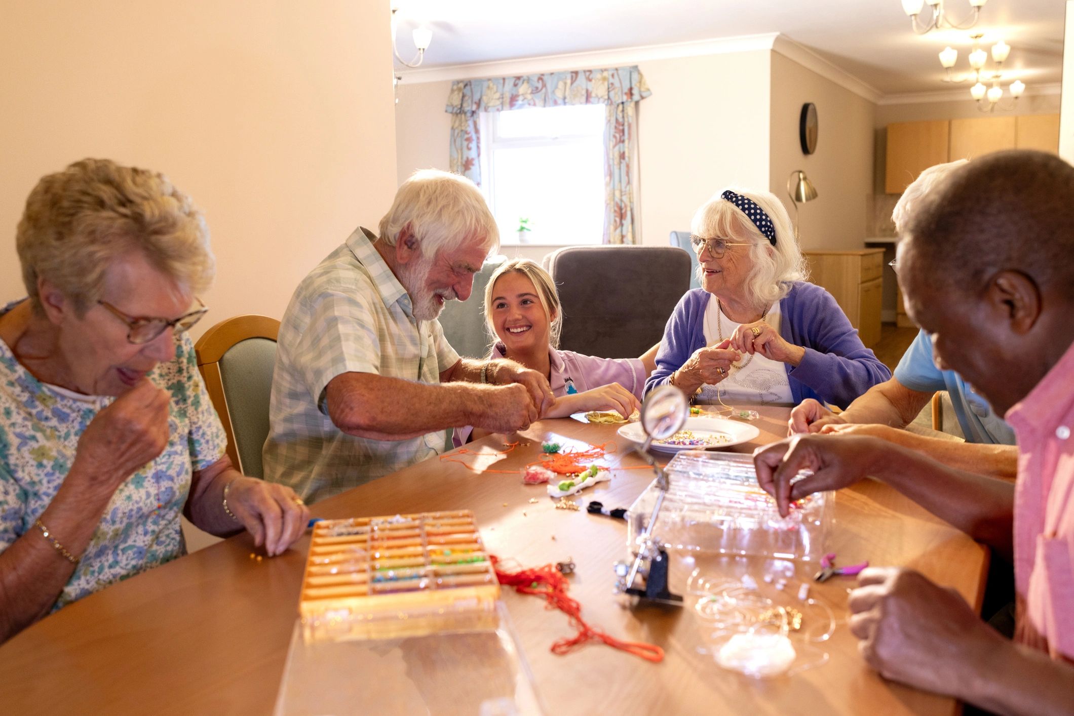 Family speaking with a senior living advisor in a welcoming care setting